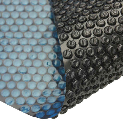 Pellicola Galleggiante Solare PE Piscina 1000x600 cm Nero e Blu