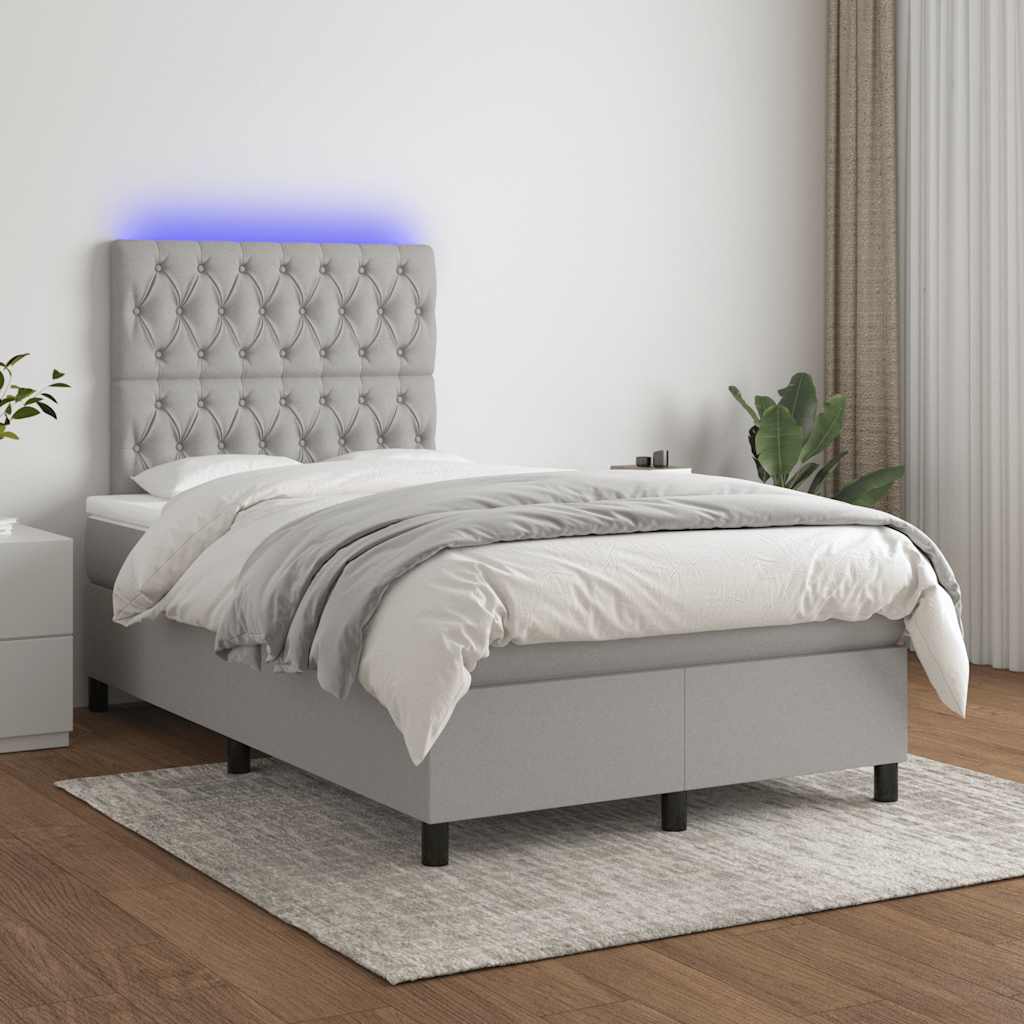 Letto a Molle Materasso e LED Grigio Chiaro 120x190 cm Tessuto